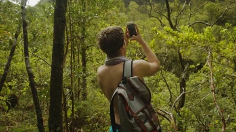 Taking A Picture Of A Waterfall Stock Footage 75252293