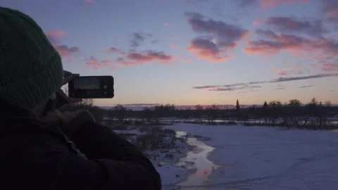 Taking picture of winter sunset landscape Video stock 148499283