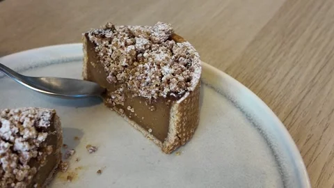 Taking a Piece of Flan with a Fork Video stock 347907264