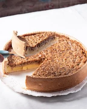Taking a piece of Walnut kuchen off the table Fotos de archivo