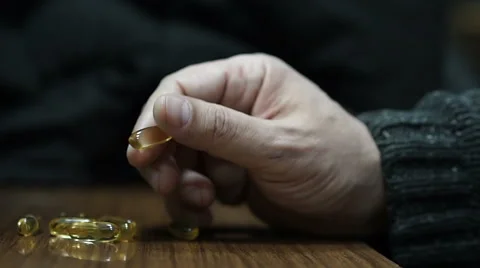 Taking pill and wait Stock Footage 58949960