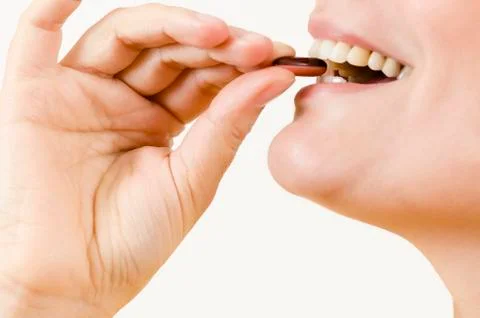 Taking a pill Stock Photos