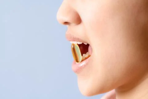 Taking a pill Stock Photos