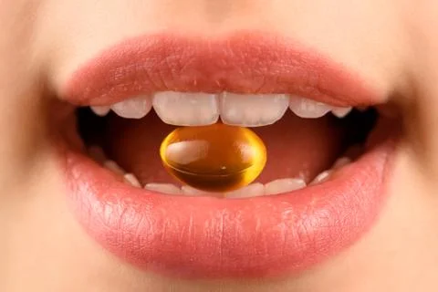 Taking a pill Stock Photos