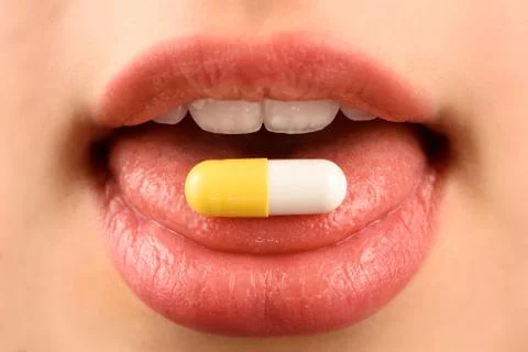 Taking a pill Stock Photos
