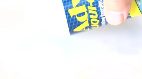Taking pills of Advil out from container Stock Footage 55862424