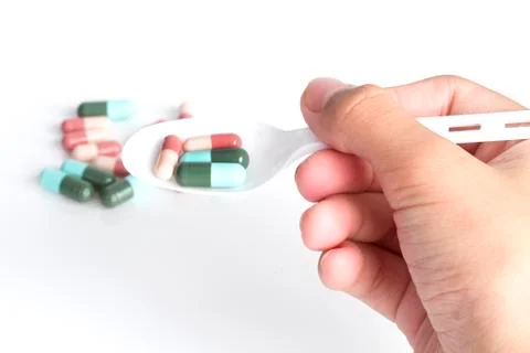 Taking pills Stock Photos