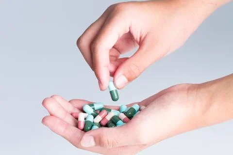 Taking pills 库存照片