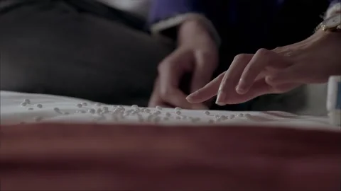 Taking pills placed on the bed Stock Footage 265537771