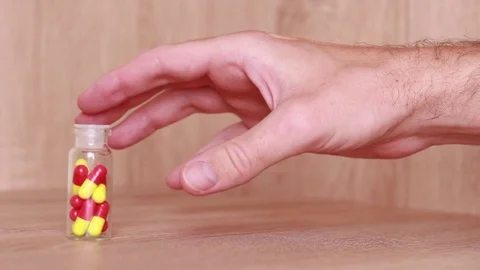 Taking pills by shaking hand Vídeo Stock 81856864