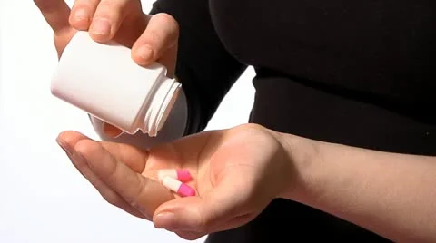 Taking pills with water Stock Footage 22666751