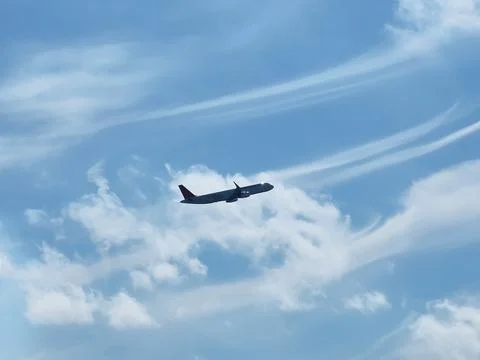 Taking off the plane in the clouds Stock Photos