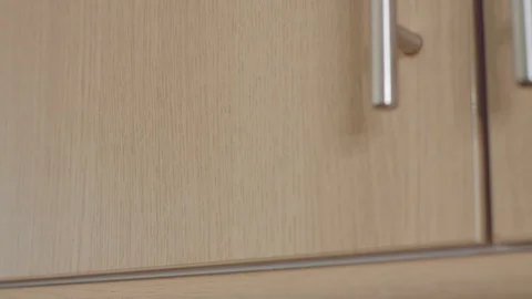 Taking A Plastic Tupperware Box Out Of A Cupboard Stock Footage 95681329