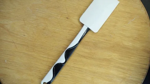 Taking off plastic wrap overhead Stock Footage 121119897