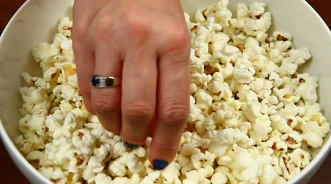 Taking pop-corns Stock Footage 46993935