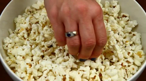 Taking pop-corns Stock Footage 46993978