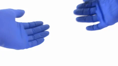 Taking Off Protective Blue Surgical Gloves on White Background POV Stock Footage 128840249