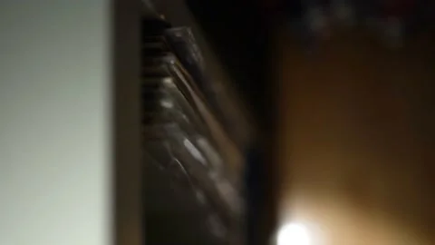 Taking a record out of the record drawer Stock Footage 180941713