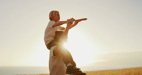 Taking a ride on dads shoulders Stock Footage 101396830