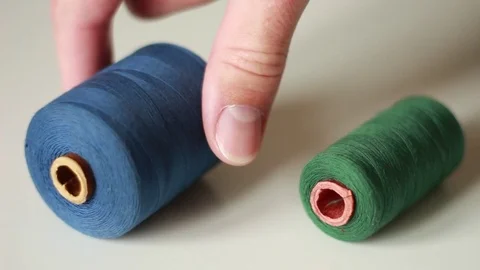 Taking right thread coil Stock Footage 76039353