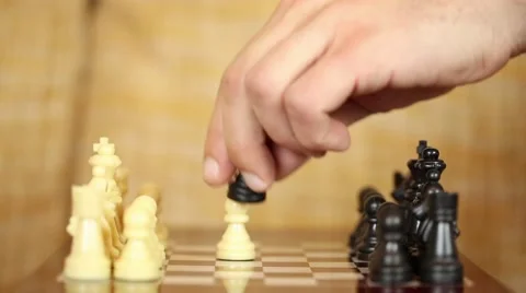 Taking risks, close-up of a man playing chess. Stock Footage 64156340
