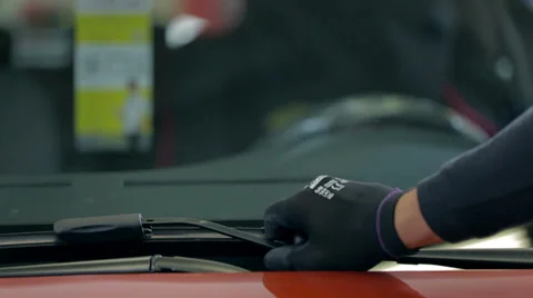 Taking the rubber off the wiper shot from behind Stock Footage 34650182