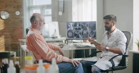 Taking saliva sample from mouth of elderly man for DNA analysis Stock Footage 93889540