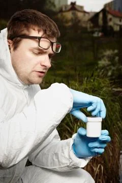 Taking sample of water outdoor Stock Photos