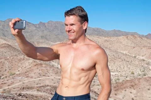 Taking a selfie in the desert Stock Photos