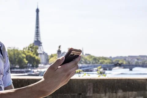 Taking a selfie with the Eiffel Tower in the background. Traveling around Par Stock Photos