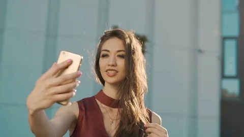 Taking Selfie by Smartphone 動画素材 77212693