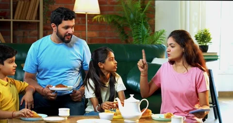 Taking selfie while eating samosa with tea, cheerful Indian family Stock Footage 342485002