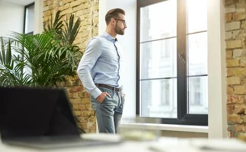 Taking short rest from work to look outside Stock Photos