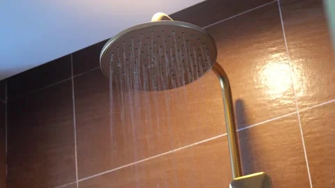Taking a shower. A shower starting and finishing to work Видео 310007941