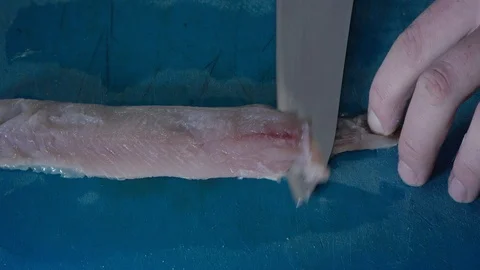 Taking off skin from fresh fish Stock Footage 87761099