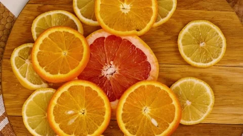 Taking a slice of orange with my hands Stock Footage 233620711