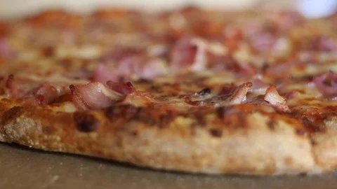 Taking slice of pizza 4k Stock Footage 74250343