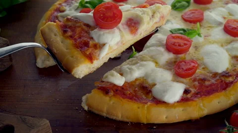Taking a slice of pizza Stock Footage 60844885