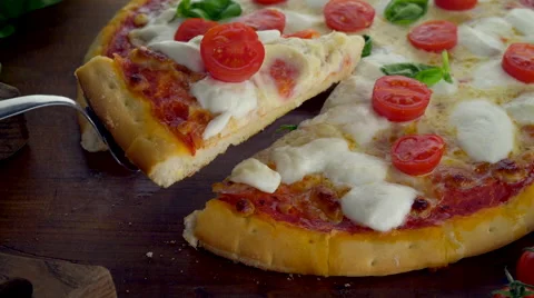 Taking a slice of pizza Stock Footage 60844951