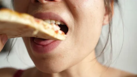 Taking slice of pizza with super stretching stretchy cheese Stock Footage 138097872