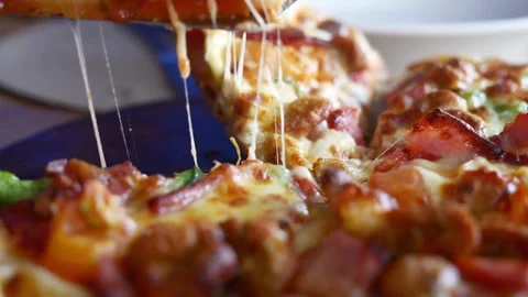 Taking slice of pizza with super stretching cheese italian pizza pepperoni Vídeos de archivo 336586801