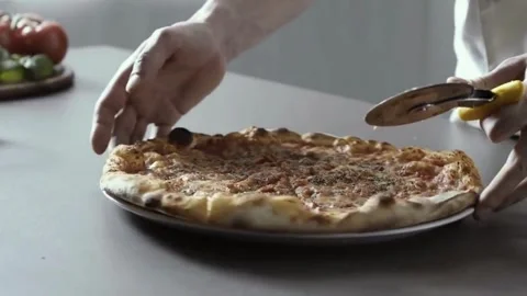 Taking slice of pizza with super stretching cheese italian pizza pepperoni. 動画素材 336586803