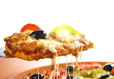 Taking slice of pizza,melted cheese dripping Stock Photos