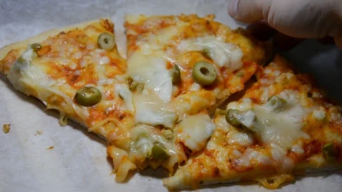 Taking slice of tasty pizza close-up. Selective focus. 動画素材 124747834