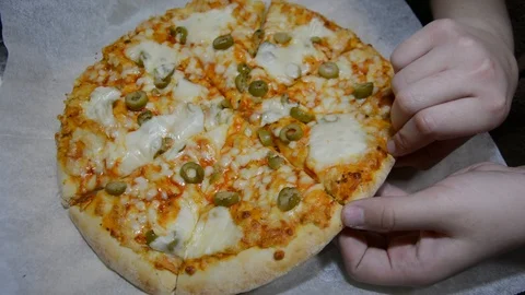 Taking slice of tasty pizza close-up. Selective focus. Stock Footage 124748020