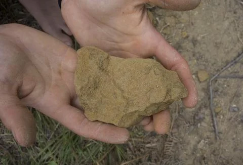 Taking a soil sample on a field Stock Photos