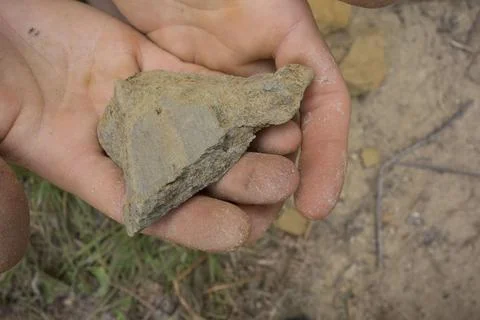 Taking a soil sample on a field Stock Photos