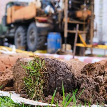 Taking soil samples for analysis in geological engineering studies Stock Photos