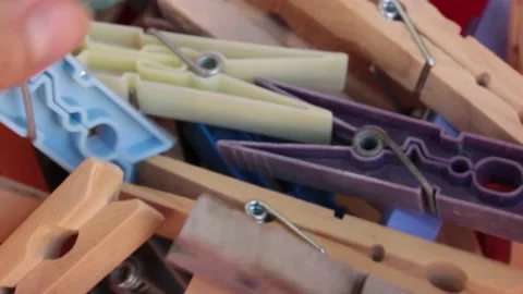 Taking some clothespin after laudry Stock Footage 142264049