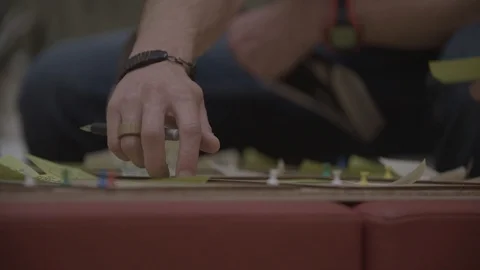 Taking off a sticky note Stockbeeldmateriaal 92314484